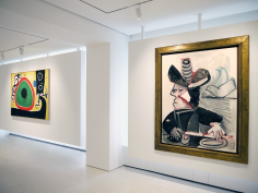 Installation view of Selected Works by 20th Century Masters featuring a different angle of the two paintings of Joan Miró, Oiseaux en Fête pour le lever du Jour, 21 Mars 1968, 1968 Oil on canvas 130 x 195 cm. (51 1/8 x 76 3/8 in.) and Pablo Picasso, Mousquetaire aux Oiseaux II, 13 January 1972, 1972 Oil on canvas 146 x 114 cm. (57 1/2 x 44 7/8 in. )installed on the same wall of the main gallery space. Photography by Bianca Boragi. ©Helly Nahmad Gallery NY.