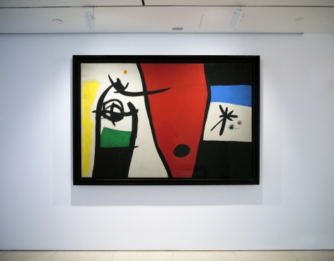 Installation view of Selected Works by 20th Century Masters featuring Joan Miró's painting, Femme à la voix de rossignol dans la nuit, 1971 Oil and acrylic on canvas 129.7 x 194.3 cm. (51 1/8 x 76 1/2 in.) Photography by Bianca Boragi. ©Helly Nahmad Gallery NY.