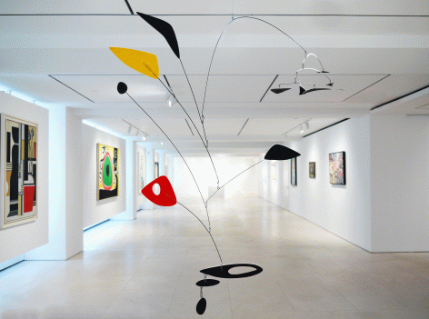 Installation view of Selected Works by 20th Century Masters featuring Alexander Calder's Hanging Mobile, Untitled, 1948, sheet metal, wire and paint, 134.6 x 182. 8 x 63.5 cm. (53 x 72 x 25 in.) Photography by Bianca Boragi. ©Helly Nahmad Gallery NY.